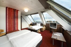 Biancheria da letto di alta qualità, minibar, cassaforte in camera