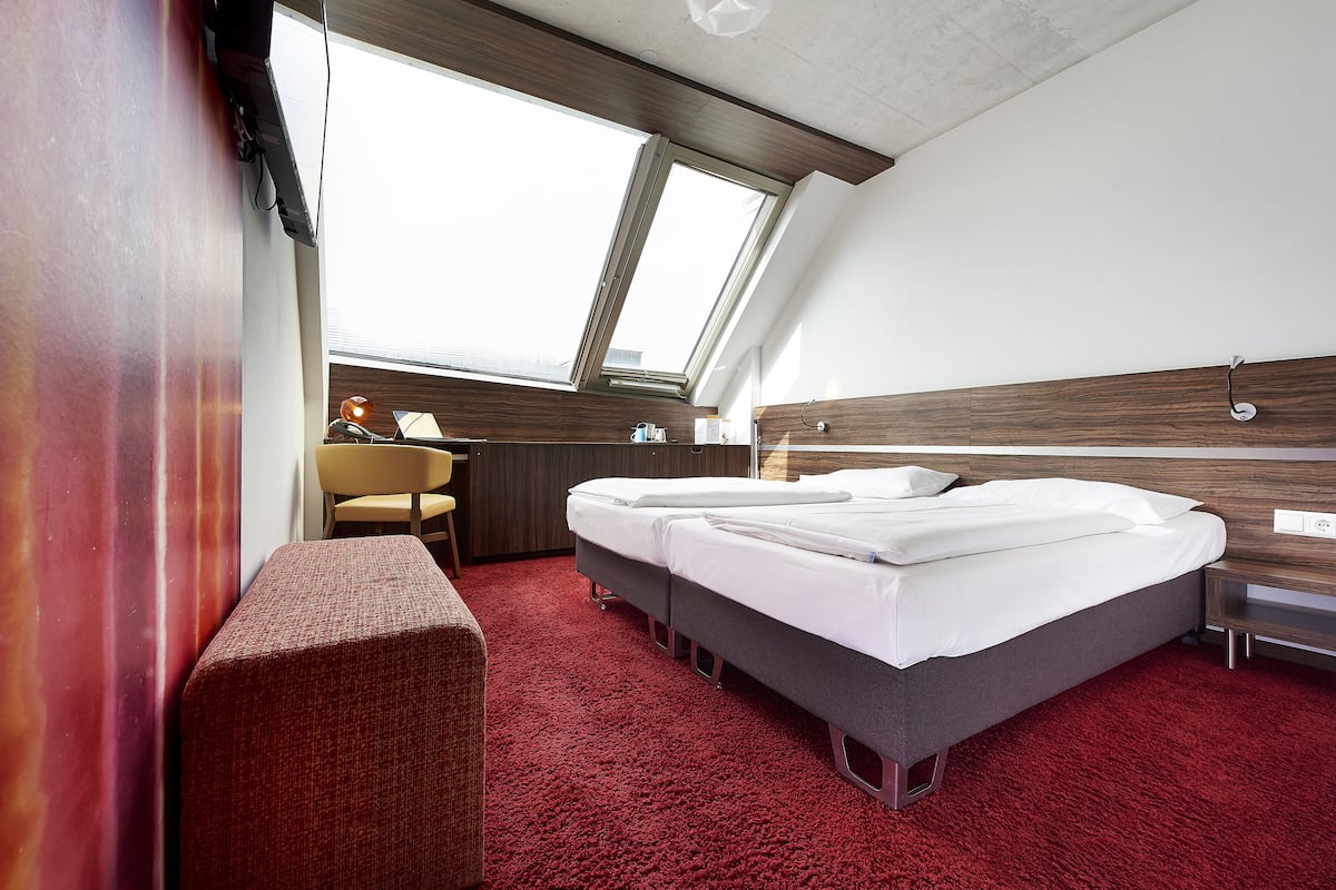 Camera Executive con 2 letti singoli | Biancheria da letto di alta qualità, minibar, cassaforte in camera