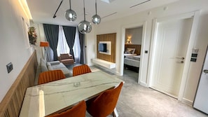Enjoy meals in the dining area with a table and four chairs.