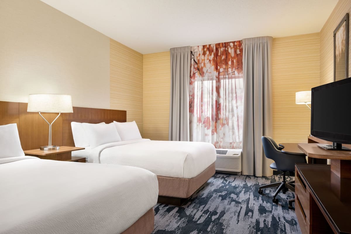 Hypo-allergenic bedding, in-room safe, desk, laptop workspace
