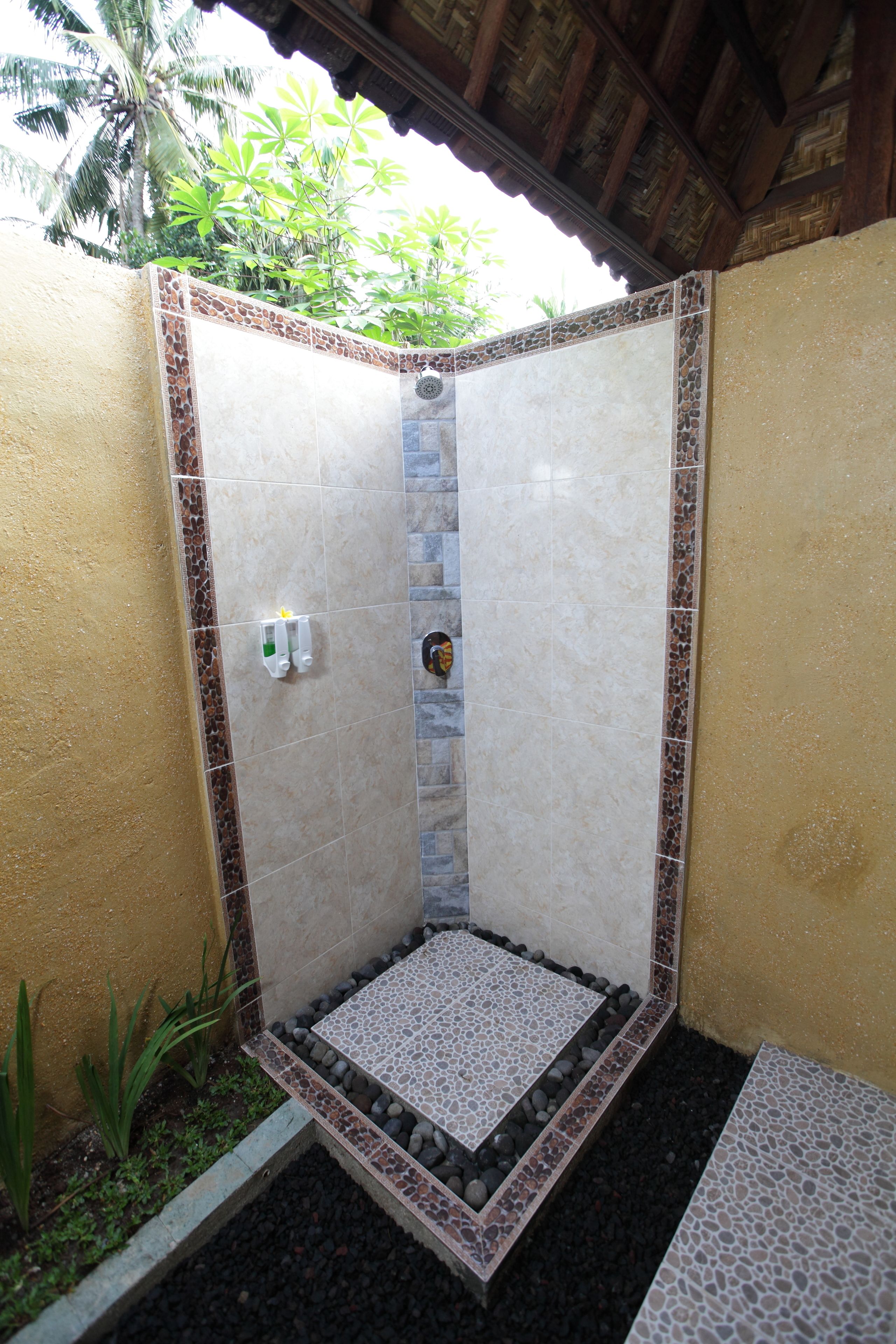 deluxe room | bathroom | shower, hair dryer, bathrobes, slippers