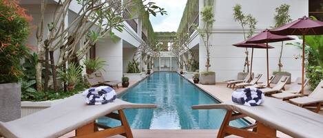 Outdoor pool, sun loungers