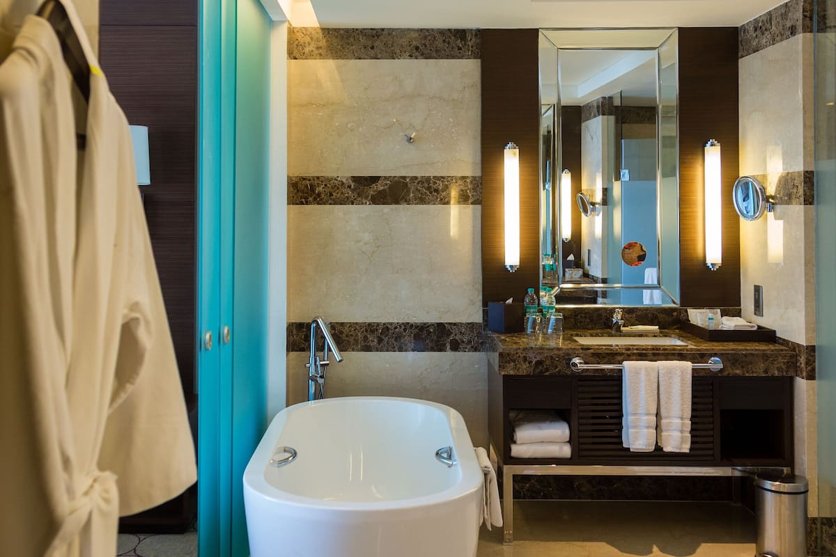 presidential suite, 1 king bed, non smoking | bathroom | separate bathtub and shower, spring water bathtub, rainfall showerhead