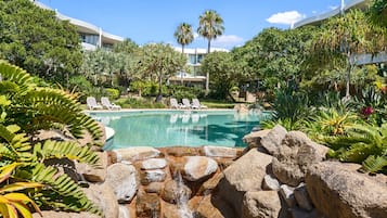 2 outdoor pools, open 8:00 AM to 8:30 PM, pool umbrellas, pool loungers
