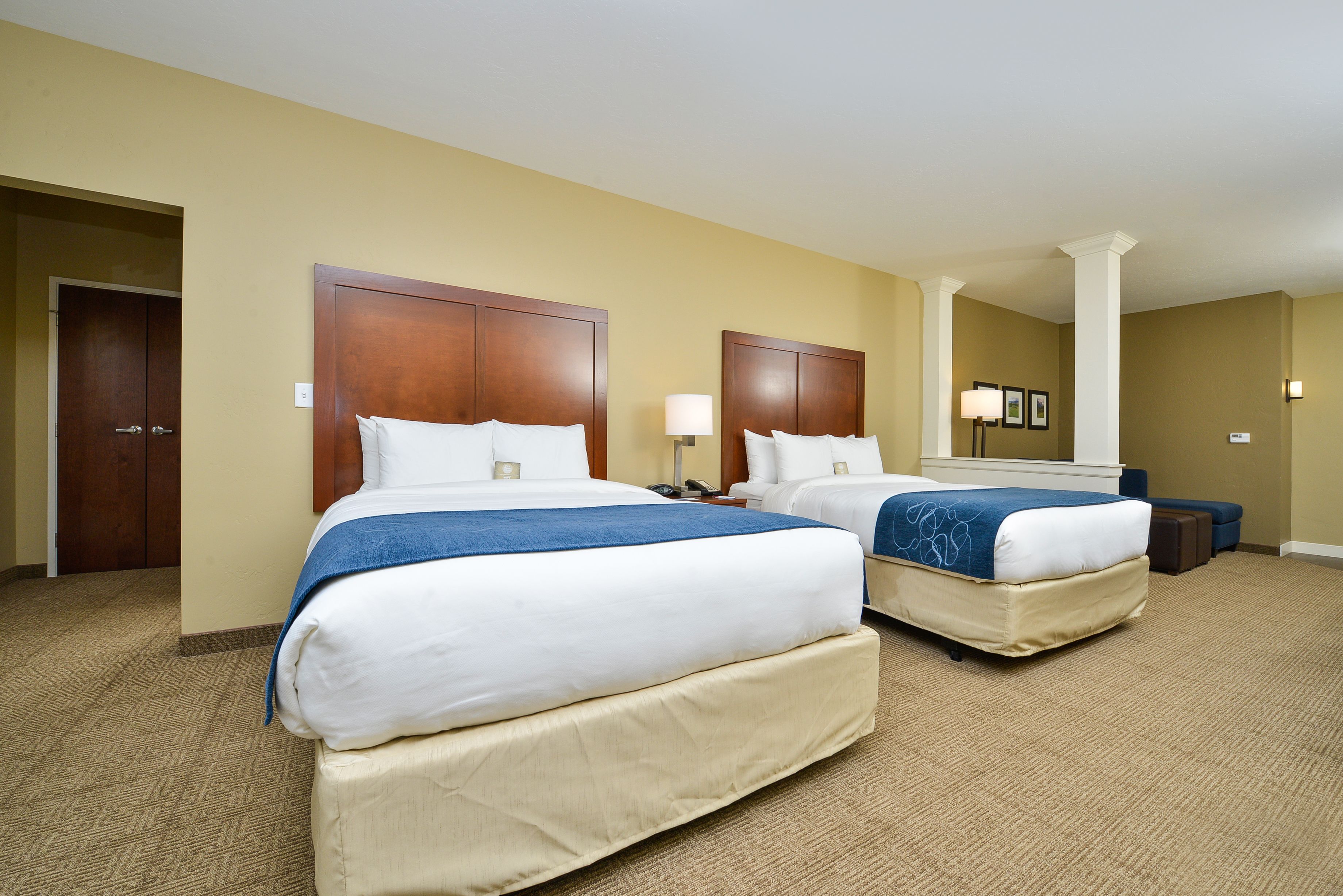 pillow-top beds, desk, blackout curtains, iron/ironing board