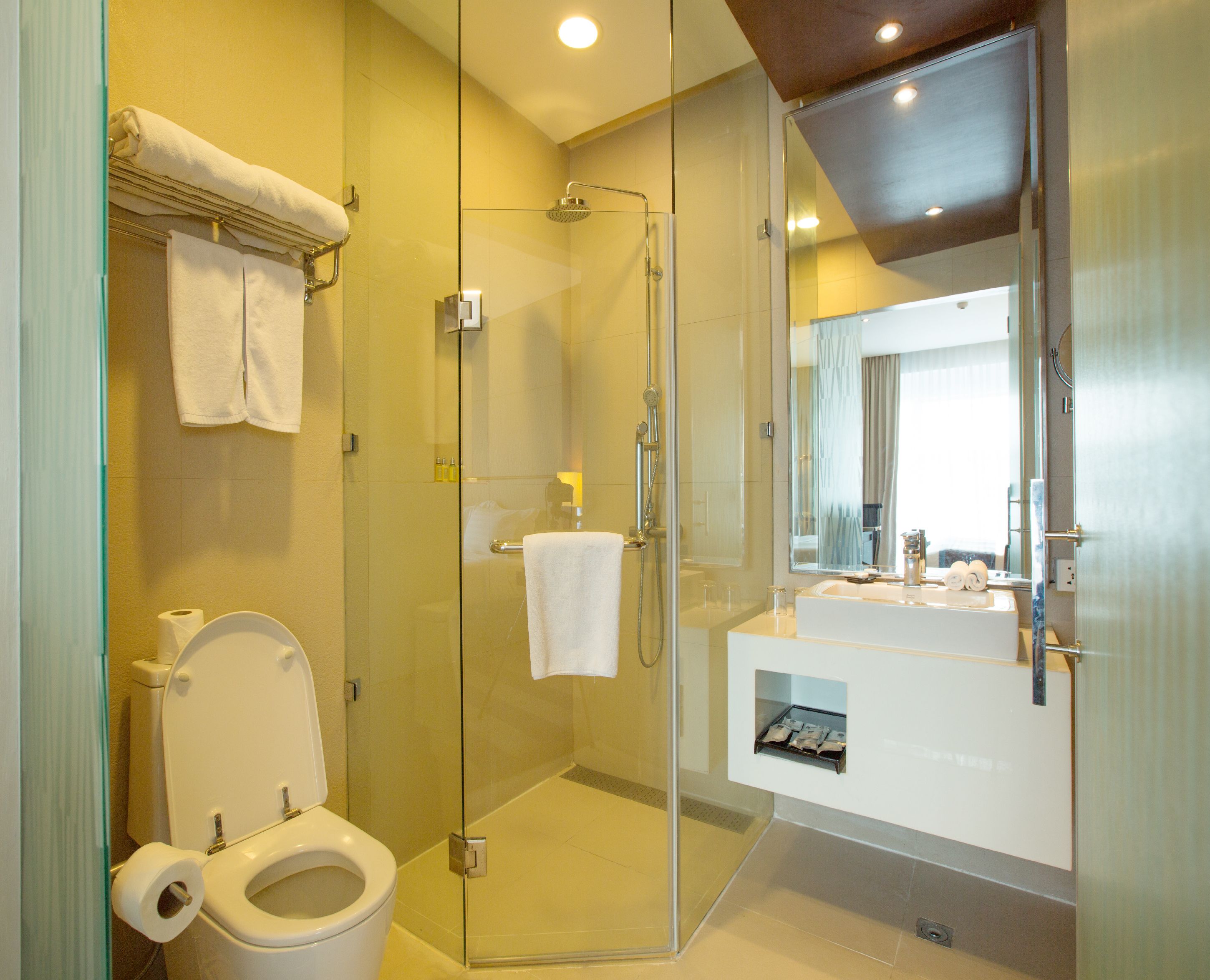 junior suite, 1 king bed, non smoking | bathroom | shower, rainfall showerhead, free toiletries, hair dryer