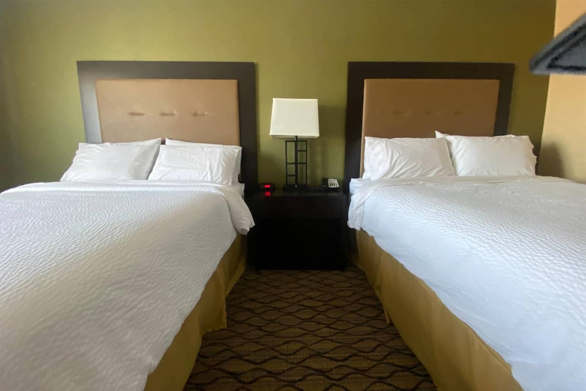 Room, 2 Queen Beds, Non Smoking | In-room safe, desk, iron/ironing board, free WiFi