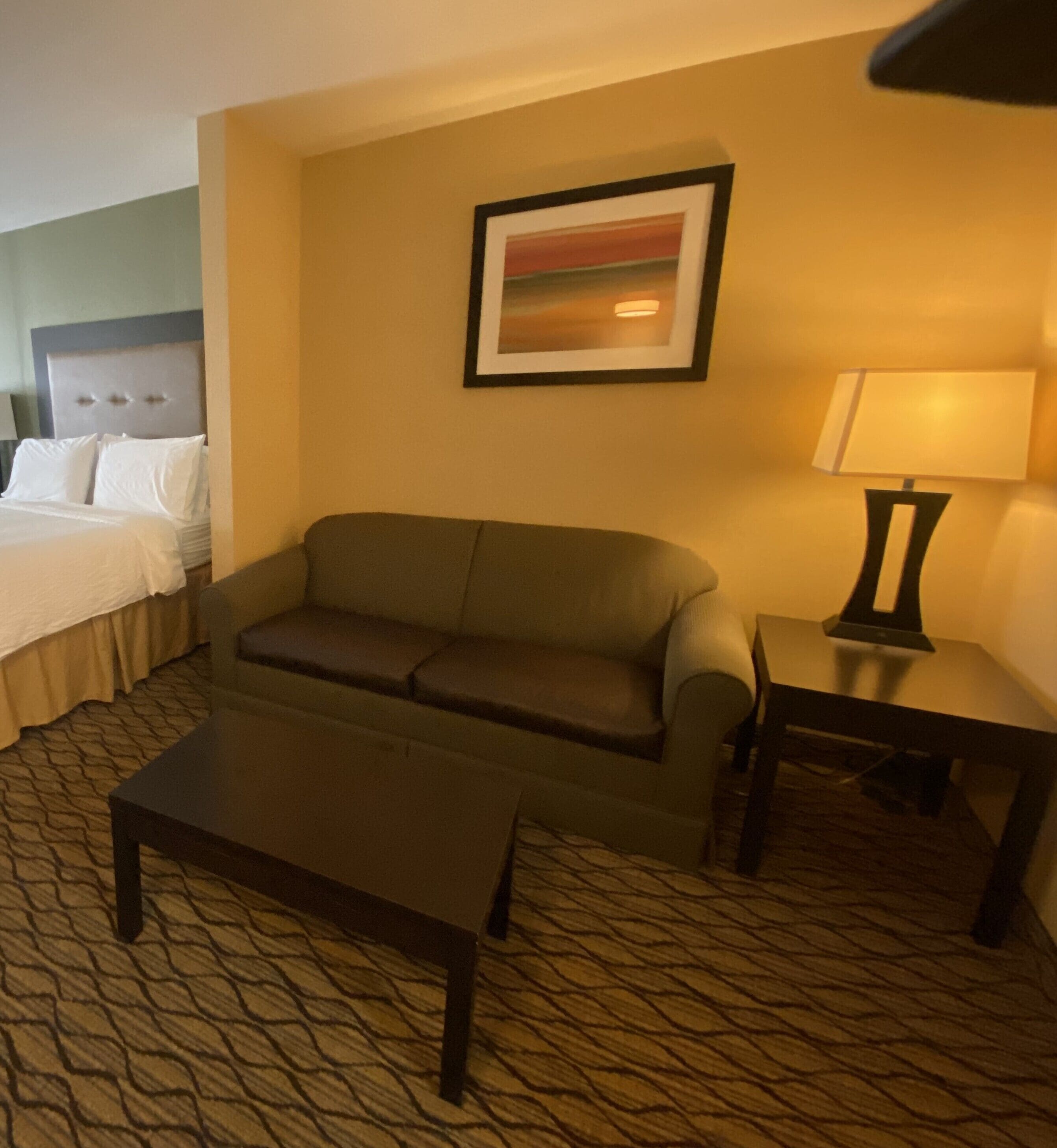 suite, 1 king bed with sofa bed, non smoking | in-room safe, desk, iron/ironing board, free wifi