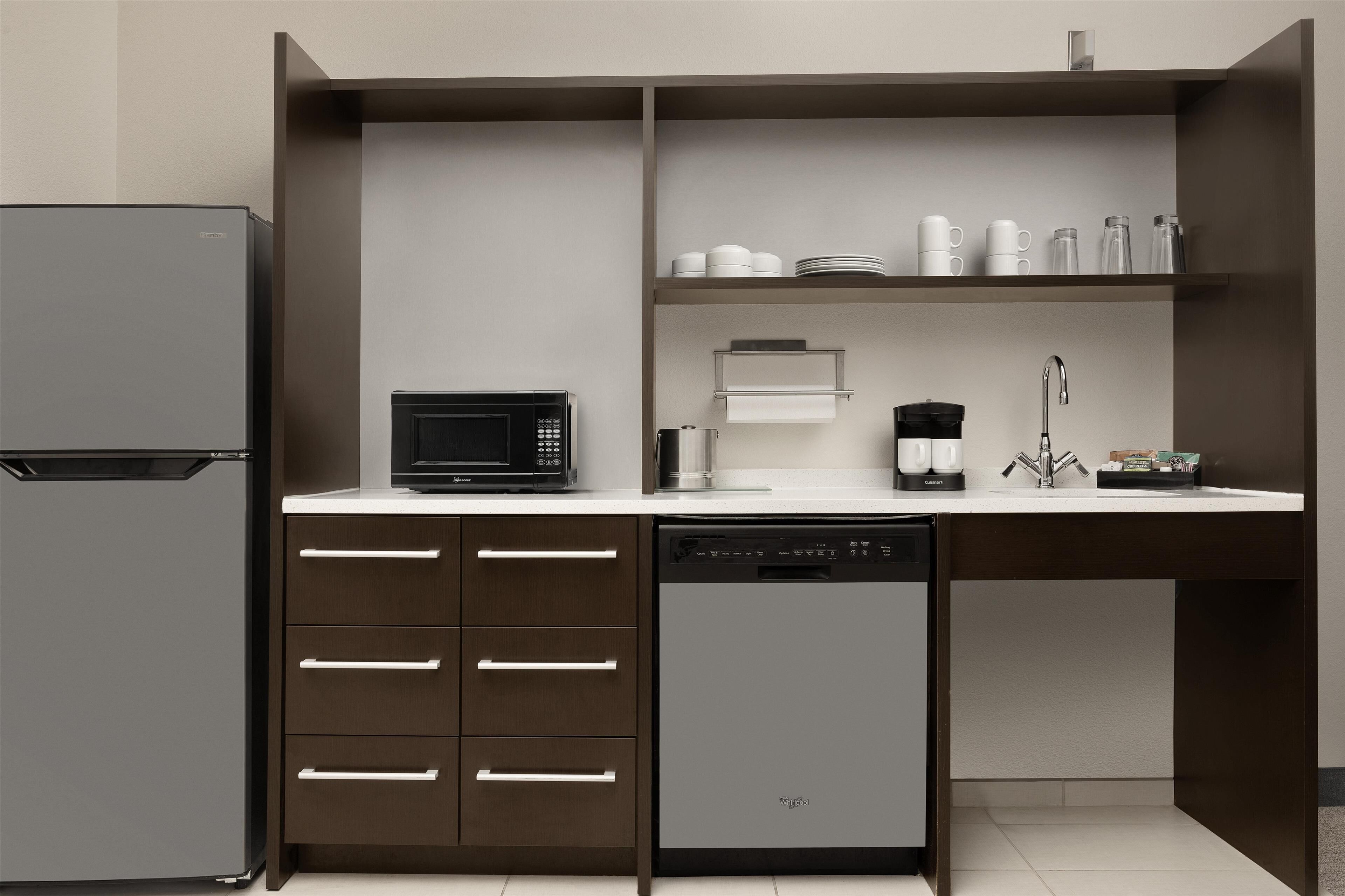 full-sized fridge, microwave, dishwasher, coffee/tea maker