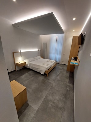 Habitación superior | Minibar, caja fuerte, escritorio y sistema de insonorización