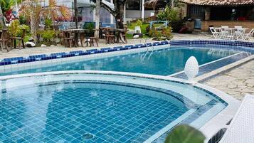 Outdoor pool, pool umbrellas, sun loungers