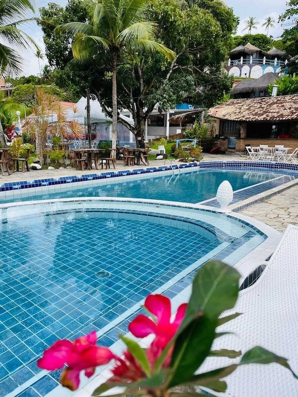 Outdoor pool, pool umbrellas, sun loungers