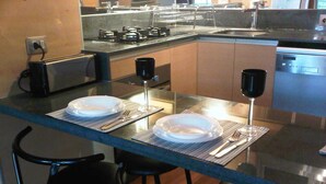 Standard Apartment, 2 Bedrooms | In-room dining - Travel Suites (Santiago)