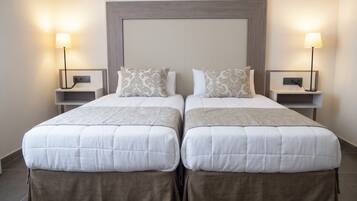 Apartamento, 1 habitación | Ropa de cama hipoalergénica y colchones con acolchado adicional