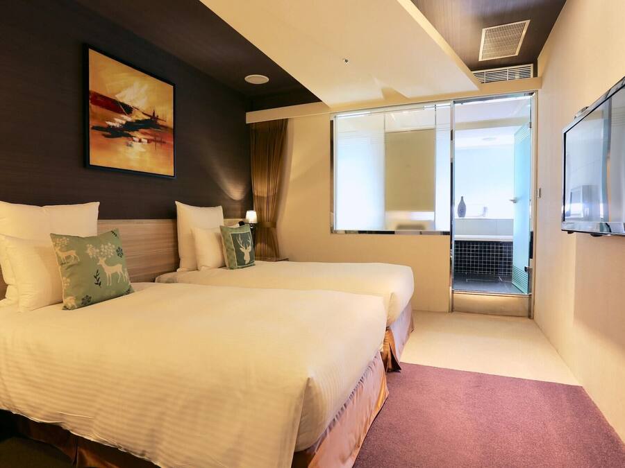 Premium bedding, down duvets, pillow-top beds, in-room safe