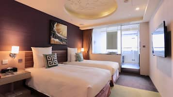 Premium bedding, down duvets, pillow-top beds, in-room safe