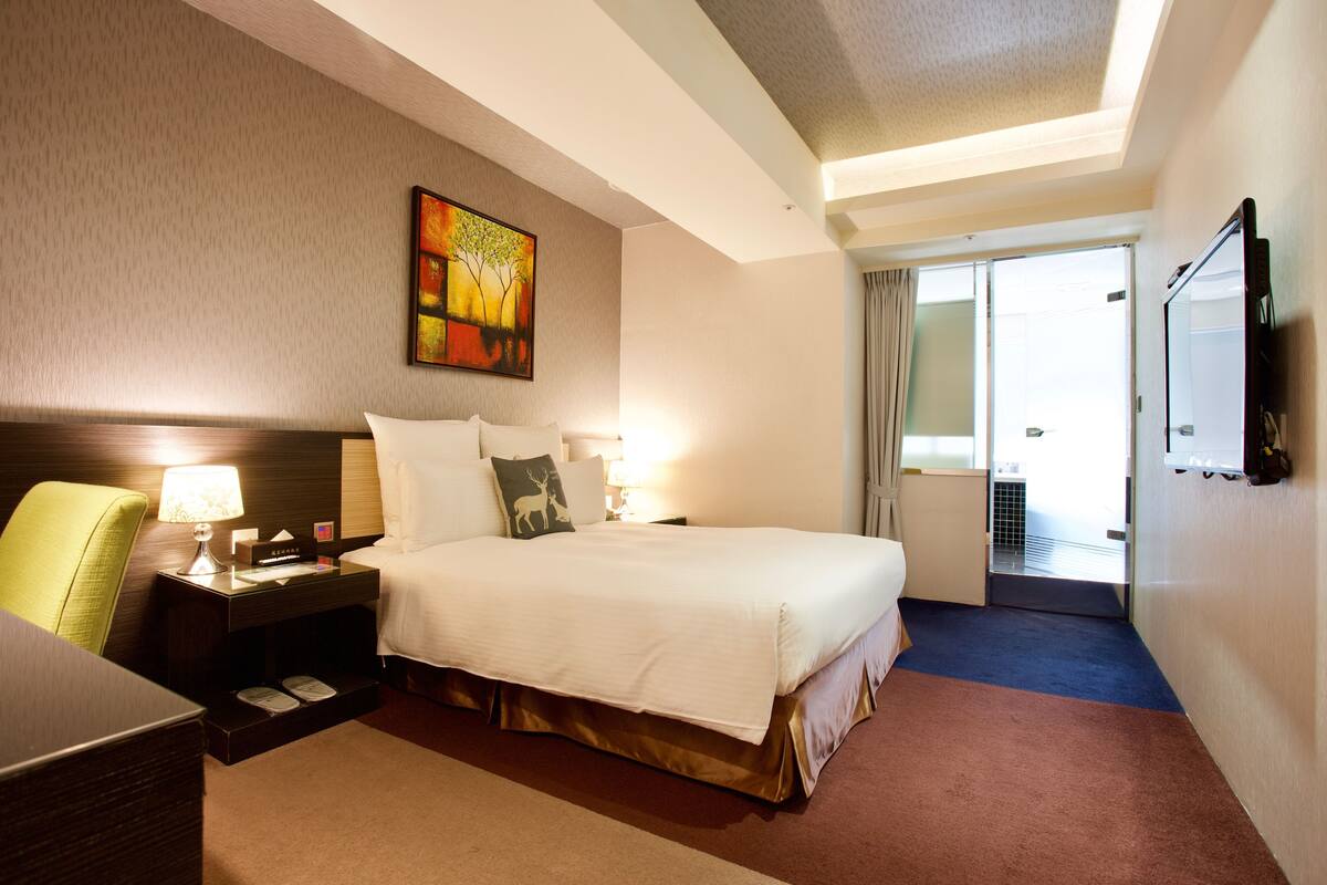 Premium bedding, down duvets, pillow-top beds, in-room safe
