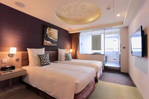 Premium bedding, down duvets, pillow-top beds, in-room safe