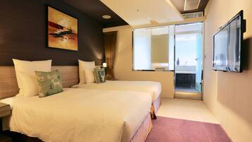 Premium bedding, down duvets, pillow-top beds, in-room safe