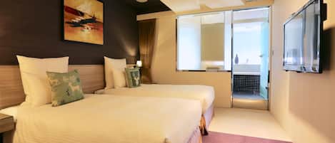 Premium bedding, down comforters, pillowtop beds, in-room safe