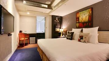 Premium bedding, down comforters, pillowtop beds, in-room safe