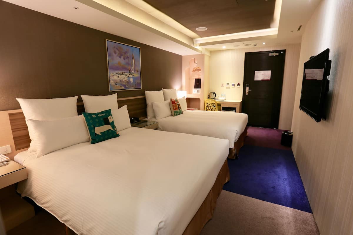 Family Room | Premium bedding, down comforters, pillowtop beds, in-room safe