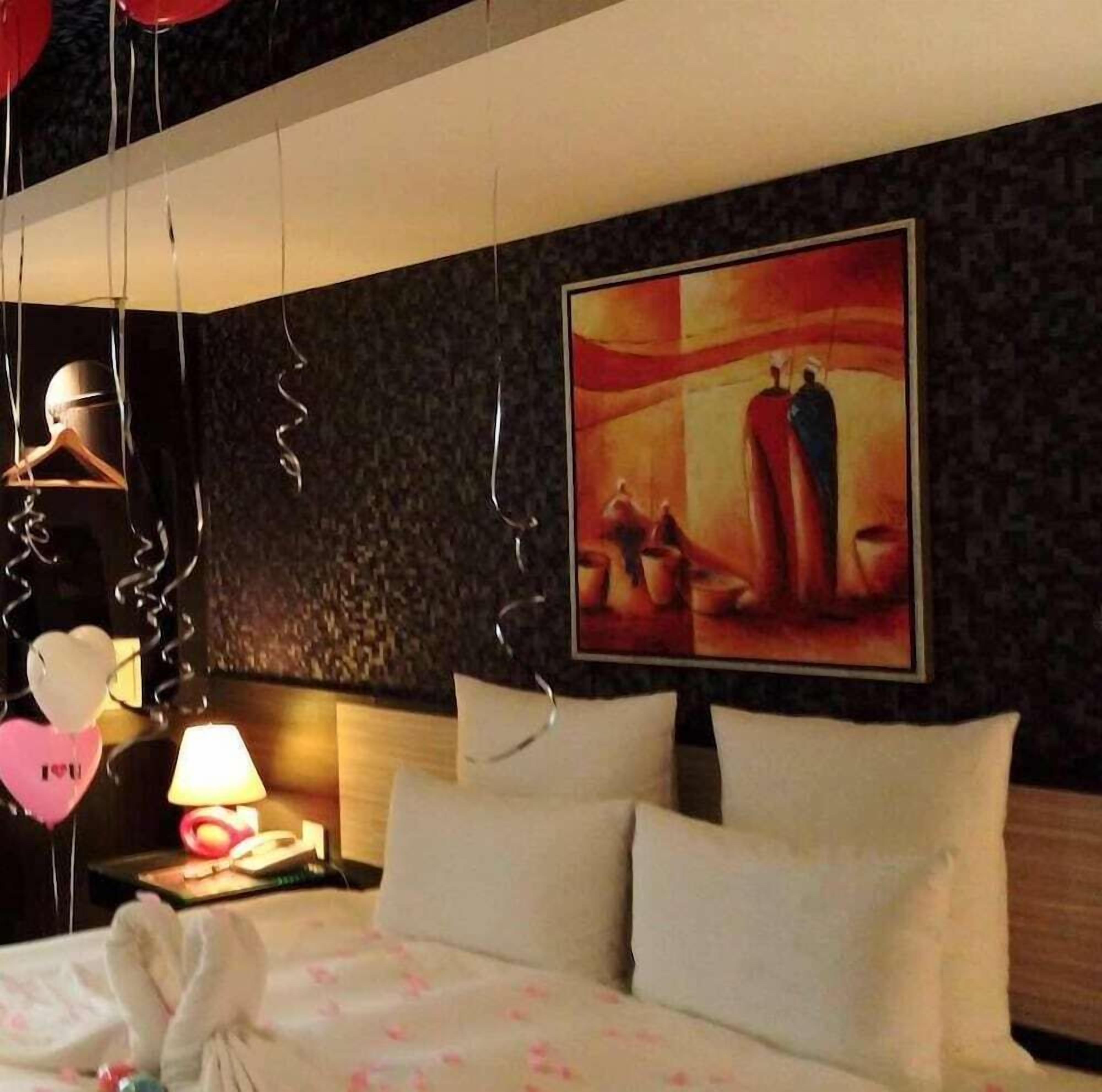 Premium bedding, down duvets, pillow-top beds, in-room safe