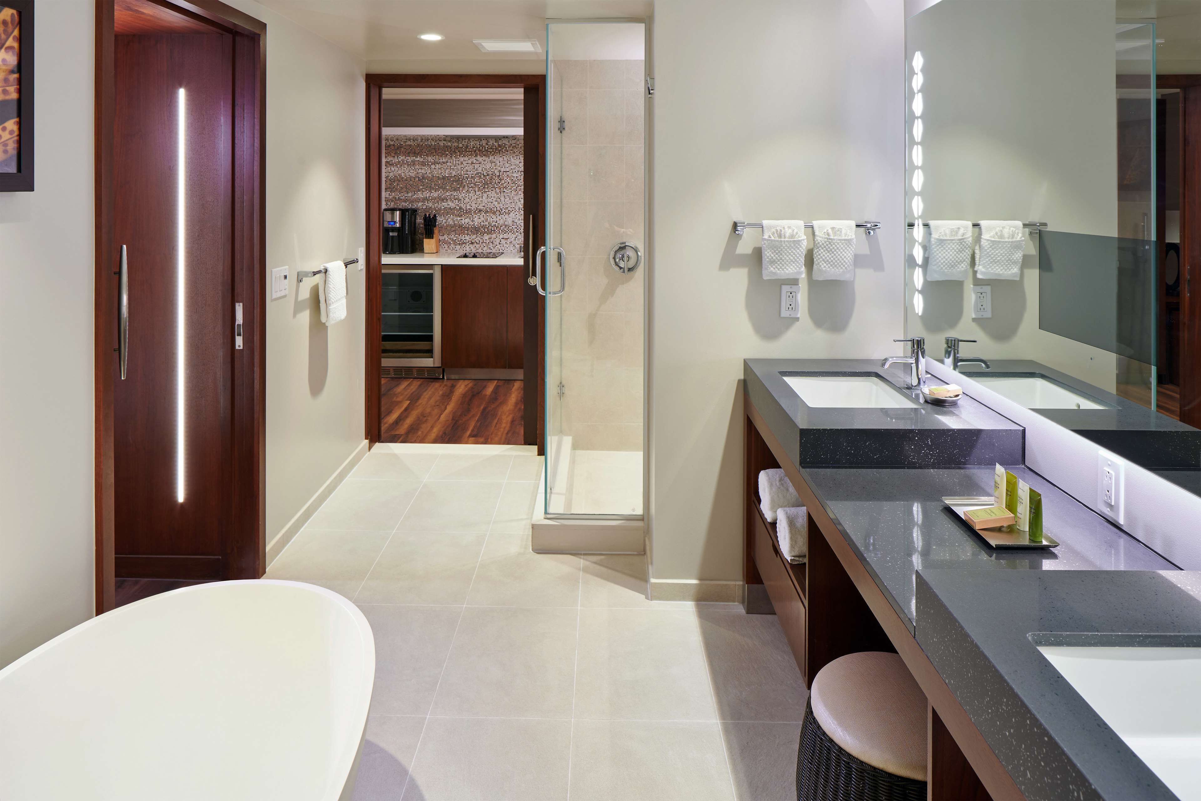 designer toiletries, hair dryer, bidet, towels