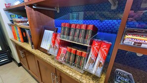 A kitchen counter with various packaged goods, including boxes of ice and other items.