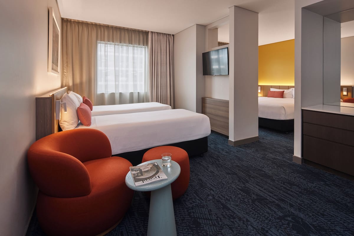Superior Family Suite | Down comforters, minibar, in-room safe, desk