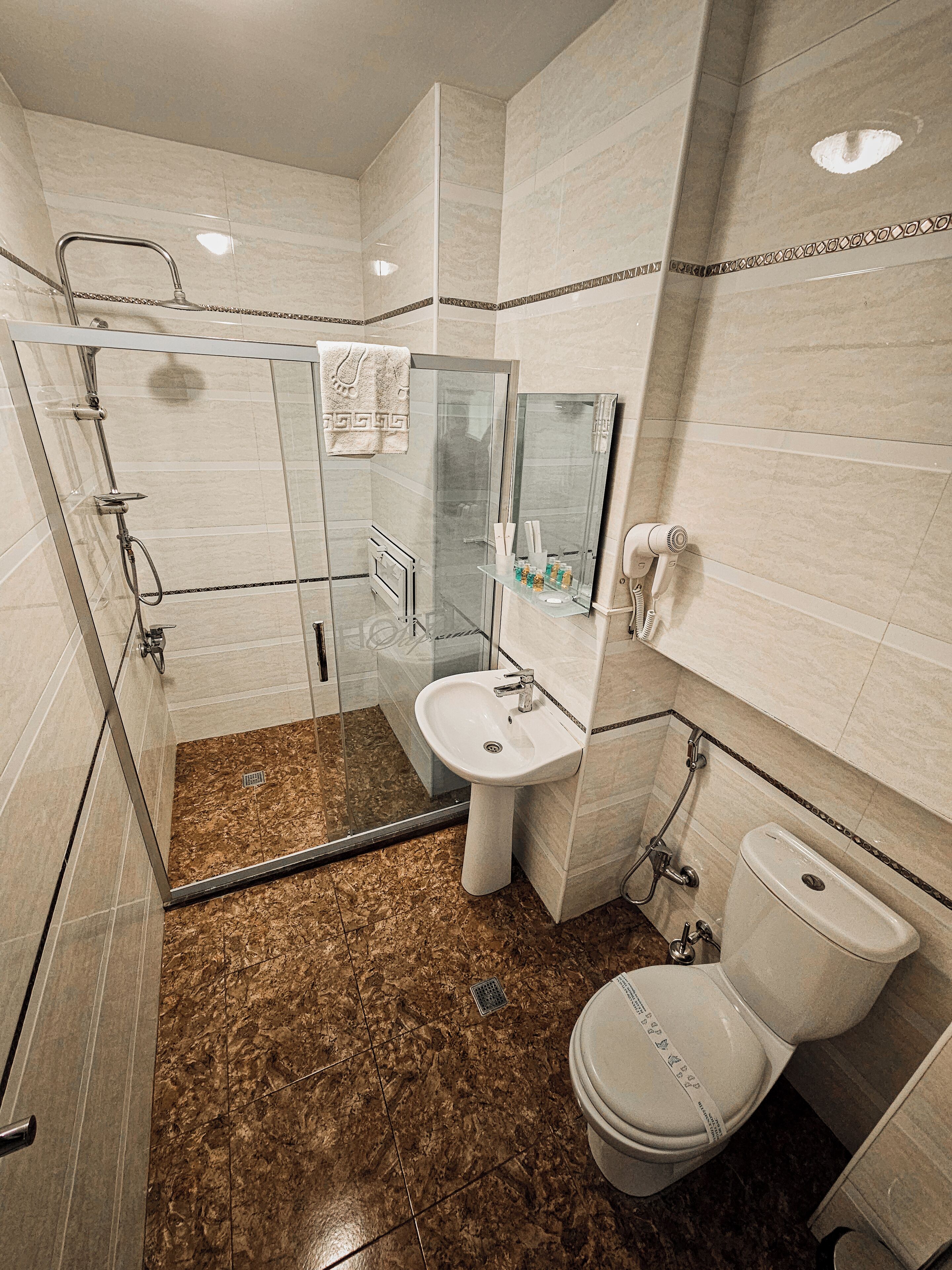 superior room | bathroom | shower, free toiletries, hair dryer, bathrobes