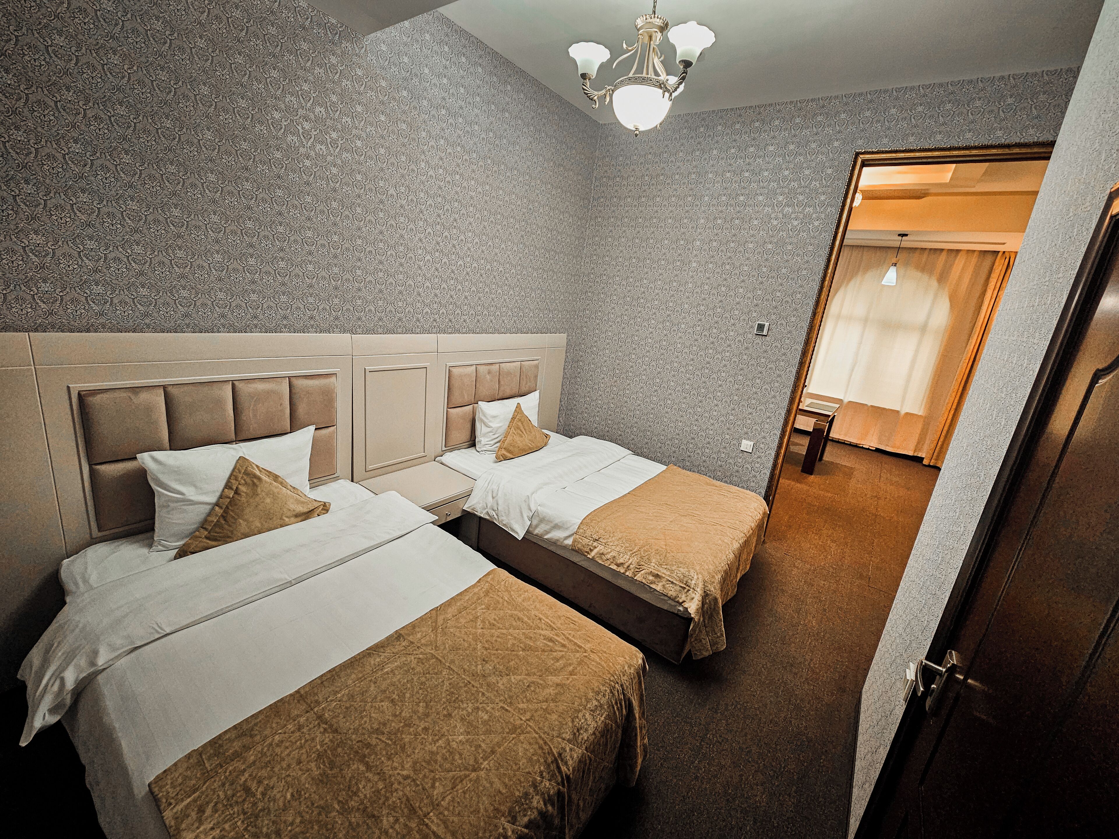 deluxe room | premium bedding, in-room safe, desk, laptop workspace