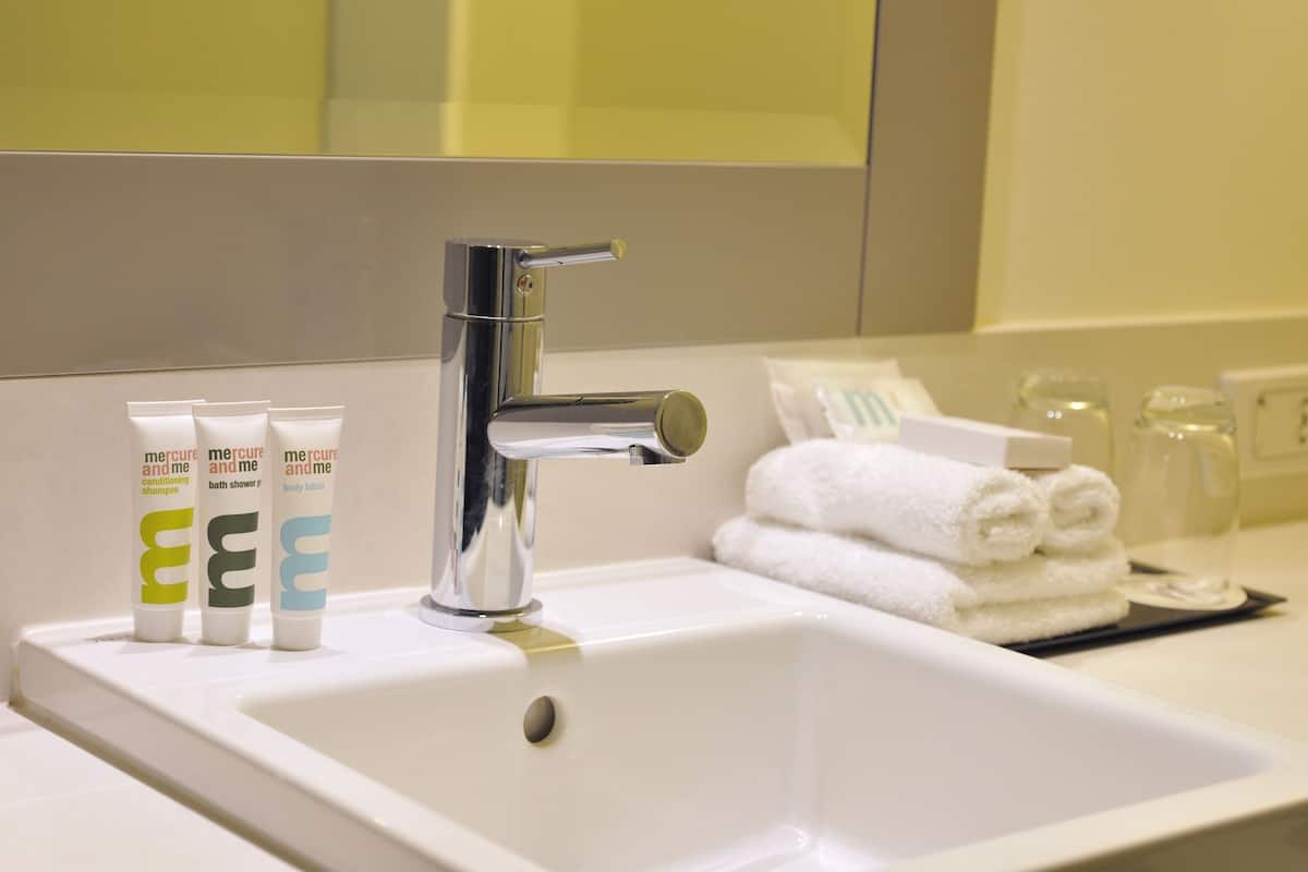 shower, eco-friendly toiletries, hair dryer, towels