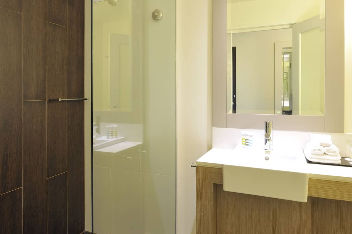 shower, eco-friendly toiletries, hair dryer, towels