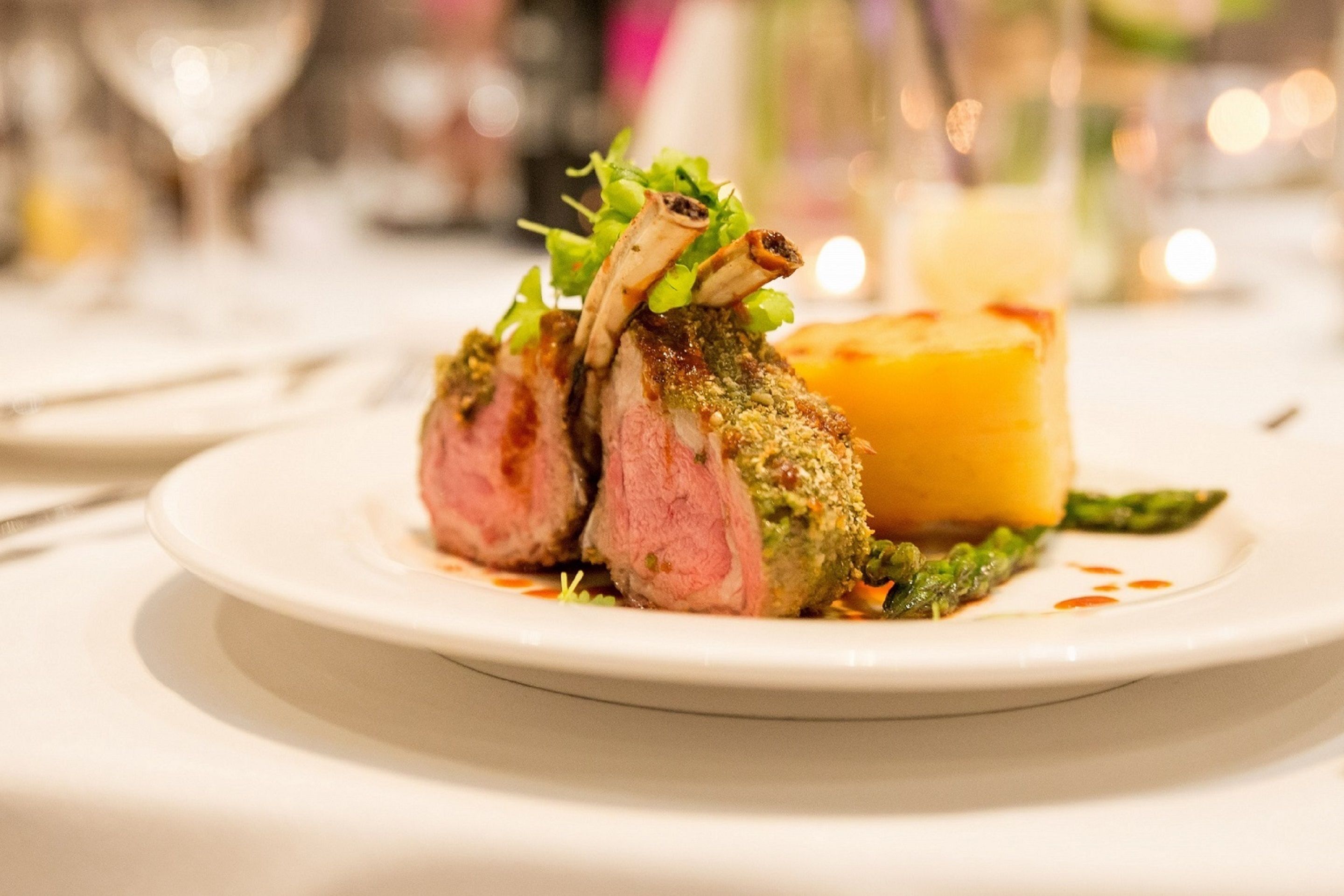 A plate with a dish of meat and vegetables.