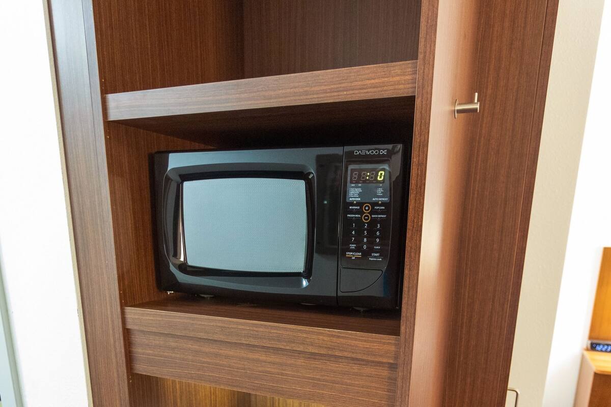 pillow-top beds, desk, blackout curtains, iron/ironing board