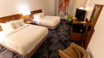 Pillow-top beds, desk, blackout curtains, iron/ironing board