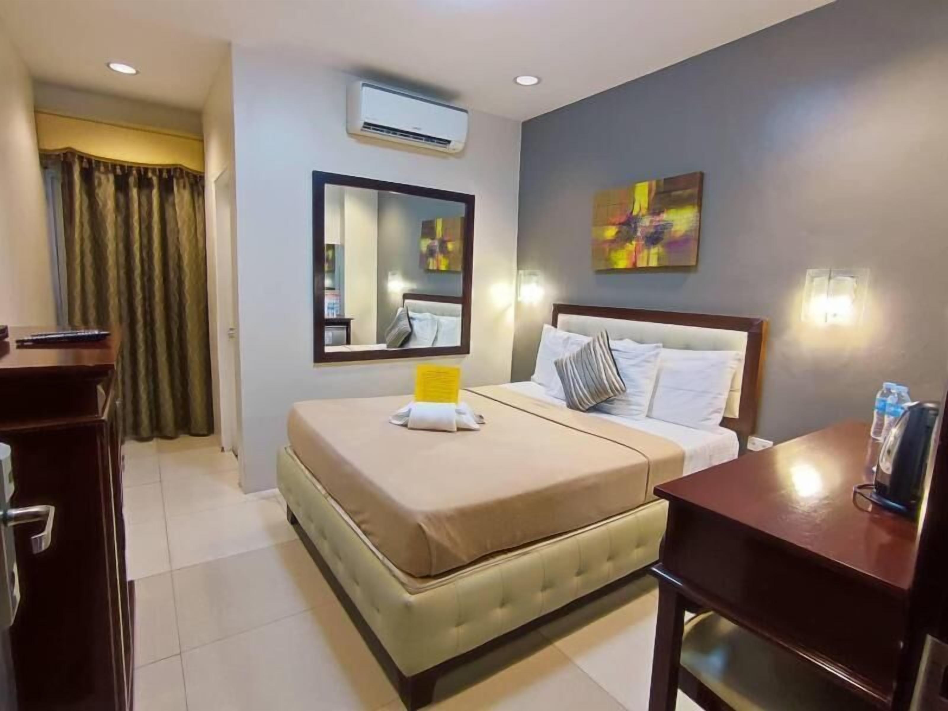 Memory foam beds, minibar, in-room safe, blackout drapes