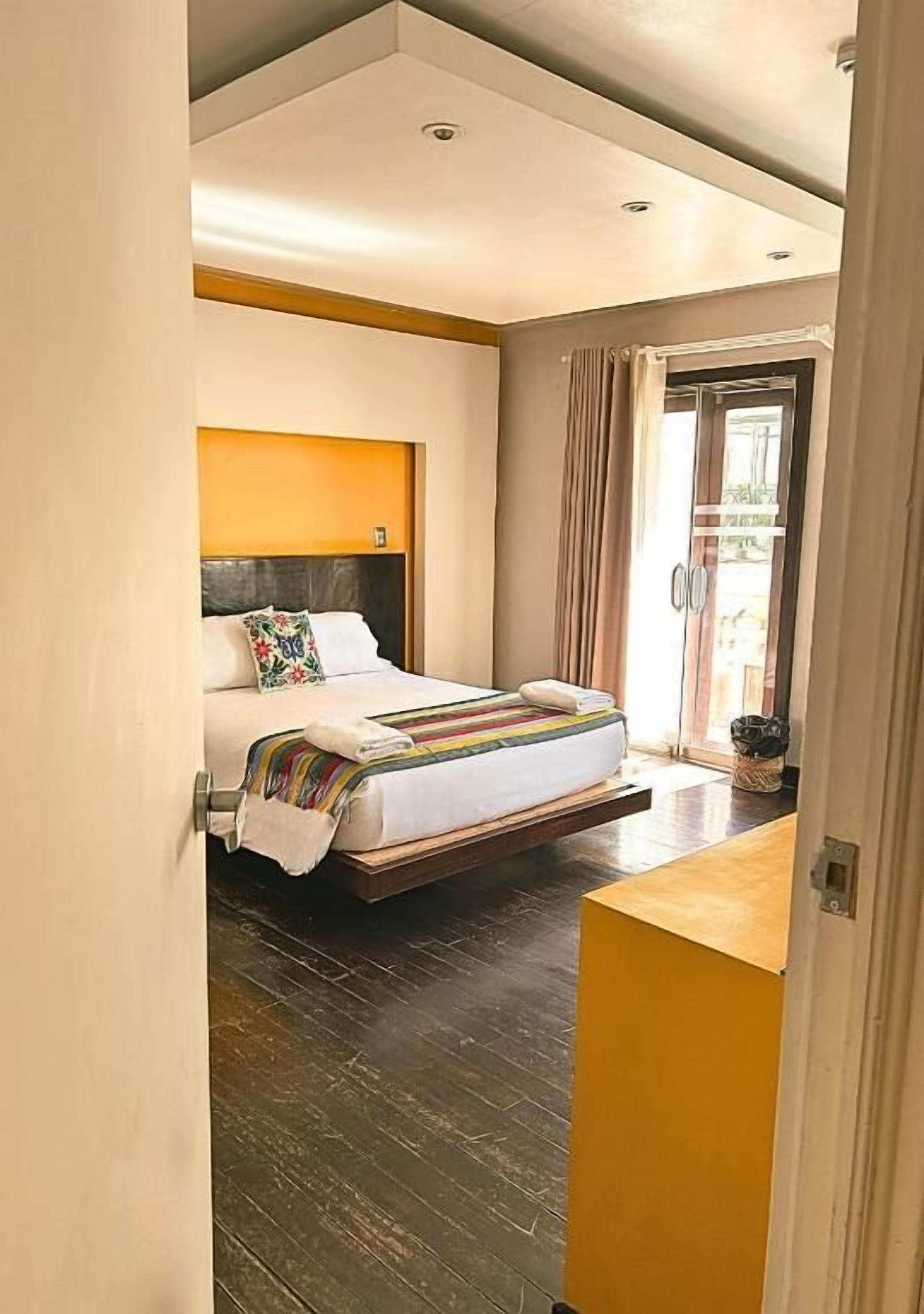 Deluxe Room (Yellow Room) | Premium bedding, down comforters, Select Comfort beds, in-room safe