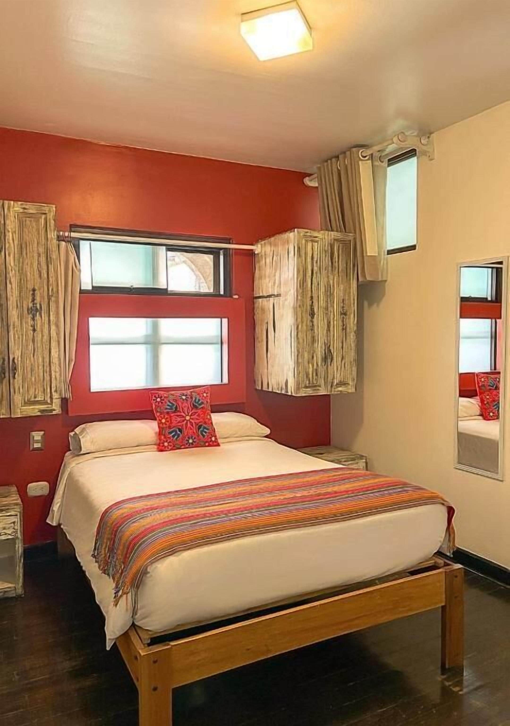 Comfort Room (Red Room) | Premium bedding, down comforters, Select Comfort beds, in-room safe