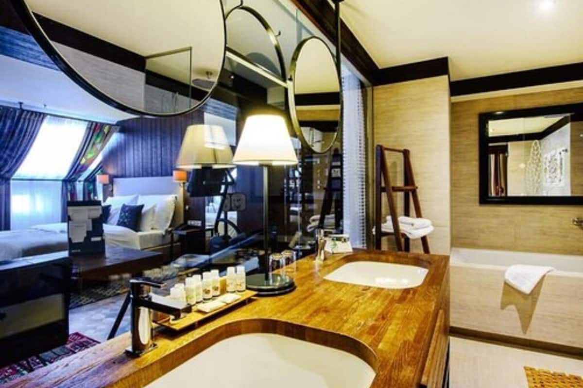 senior suite | bathroom | rainfall showerhead, designer toiletries, hair dryer, bathrobes