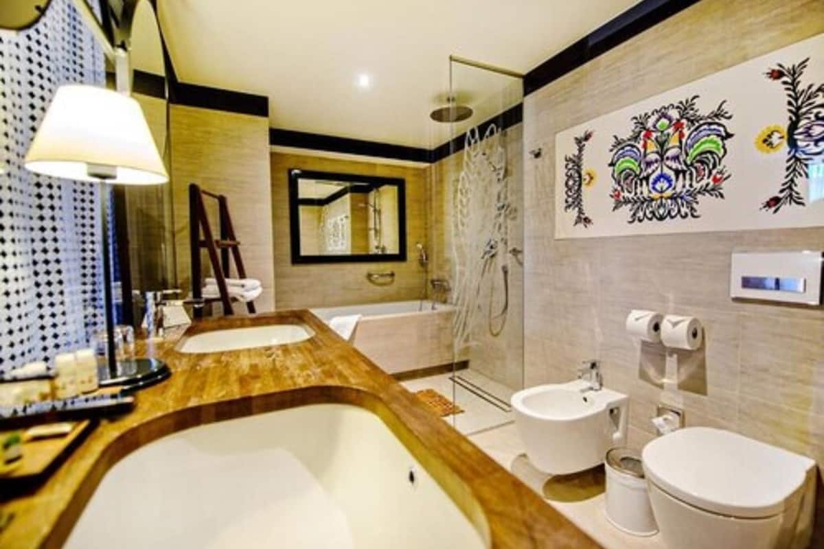 senior suite | bathroom | rainfall showerhead, designer toiletries, hair dryer, bathrobes