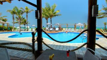 Outdoor pool, pool umbrellas, sun loungers