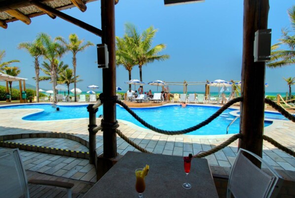 Outdoor pool, pool umbrellas, sun loungers