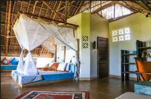 Family Suite with Partial Ocean View | Down comforters, minibar, in-room safe, desk - Sunshine Marine Lodge (Matemwe)