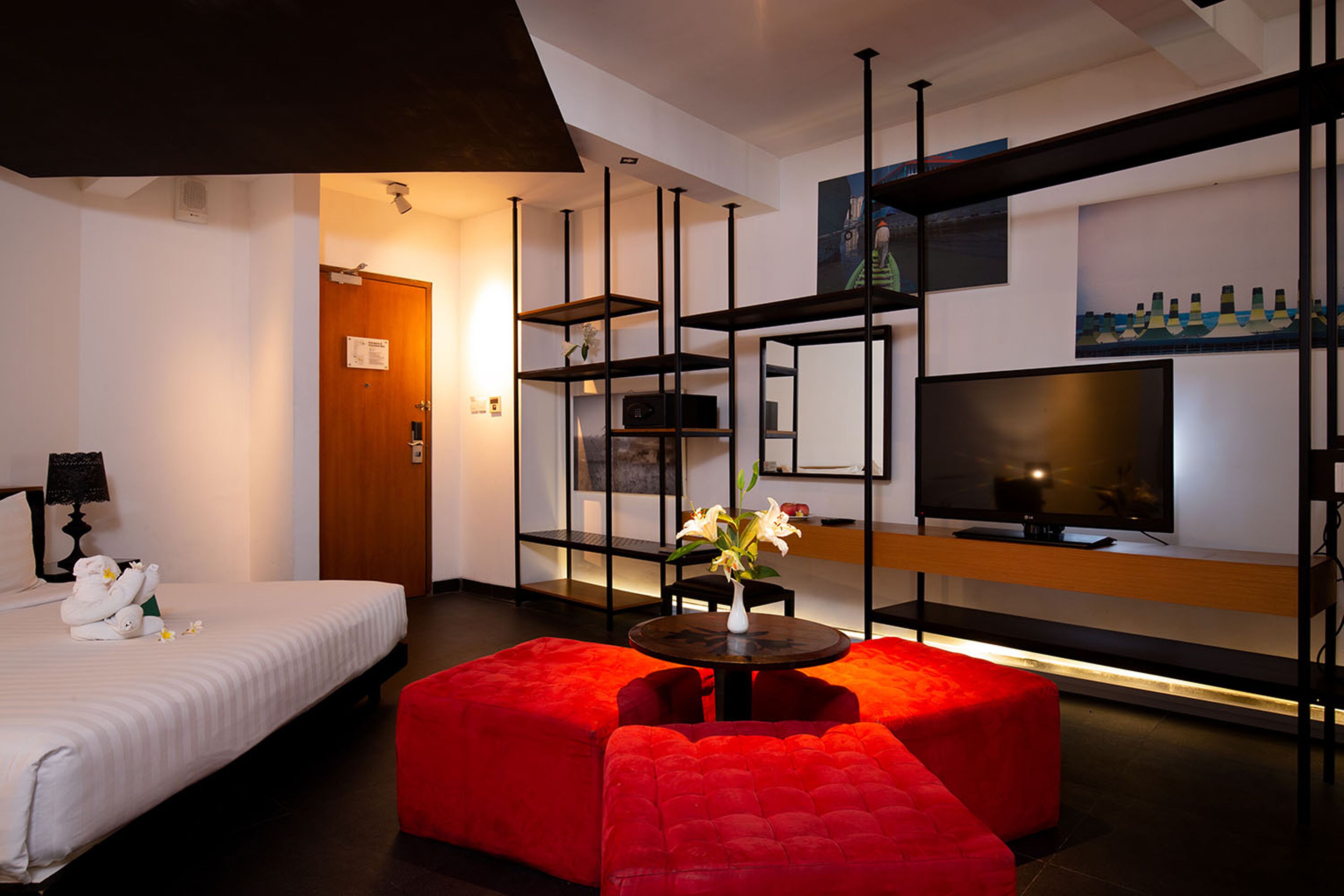 family room | 1 bedroom, premium bedding, minibar, in-room safe