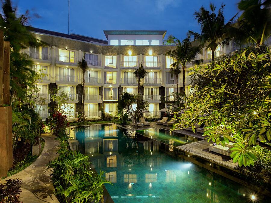 Outdoor pool, open 6:30 AM to 6:30 PM, pool umbrellas, pool loungers