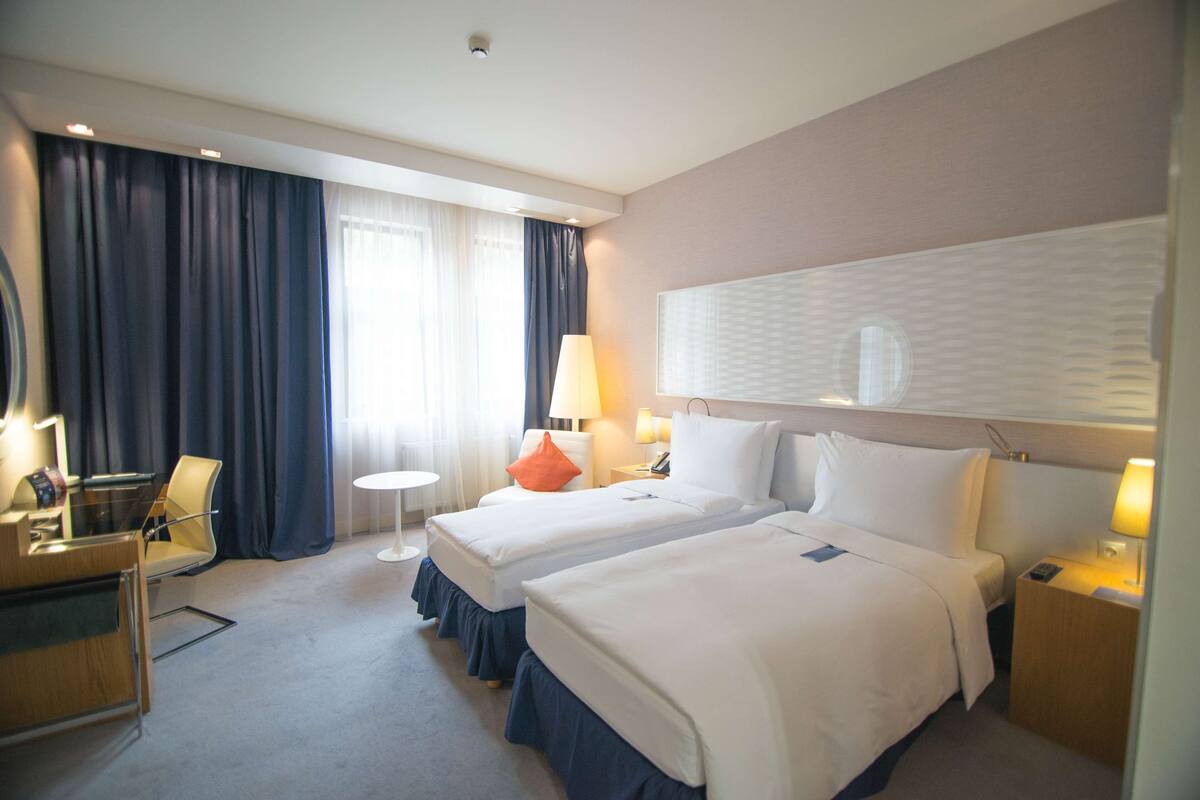 Standard Room | Free minibar items, in-room safe, desk, iron/ironing board