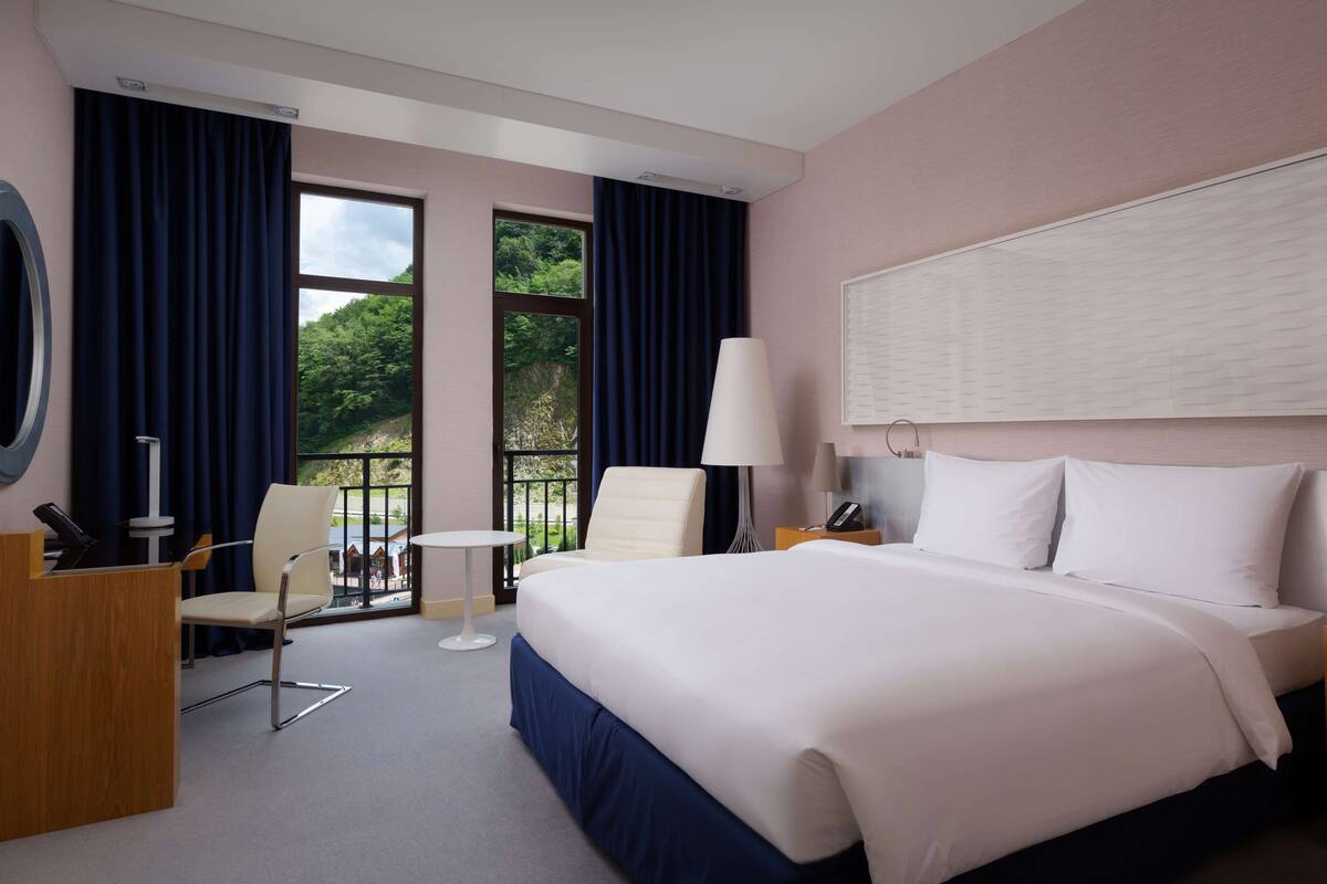 Premium Room, Balcony | Free minibar items, in-room safe, desk, iron/ironing board