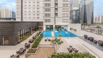 Outdoor pool, open 6:00 AM to 8:00 PM, pool umbrellas, sun loungers